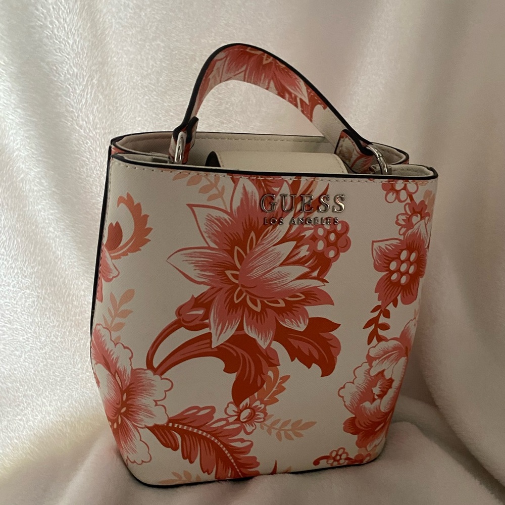 Super cute mini pink floral Guess bag
